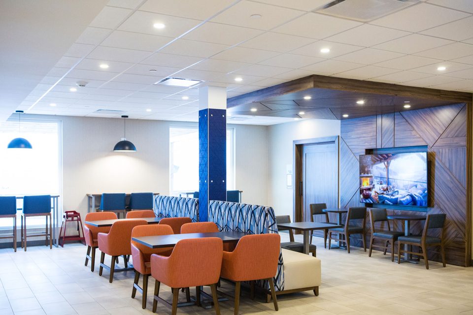 A wide angle photo of the holiday inn lounge and kitchen during a commercial photography session by UBU Photos